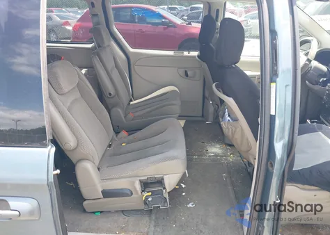 2005 Dodge Grand Caravan Sxt z USA, uszkodzony, nr VIN 2D4GP44L95R242873